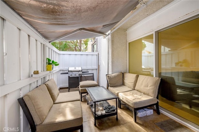 view of patio featuring a grill and a balcony