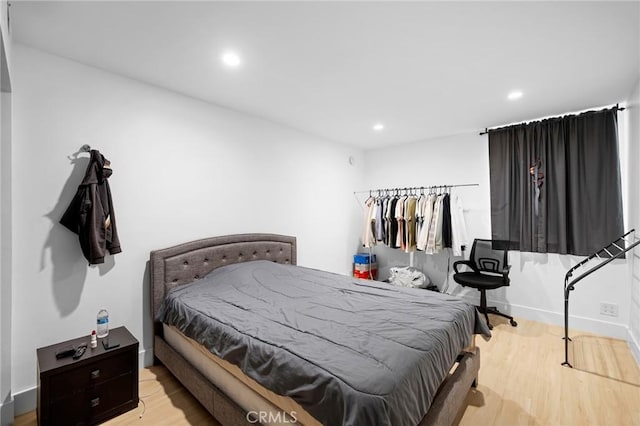 bedroom featuring light hardwood / wood-style floors