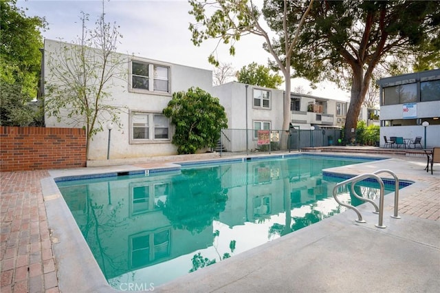 view of pool featuring a patio