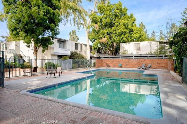 view of pool with a patio area