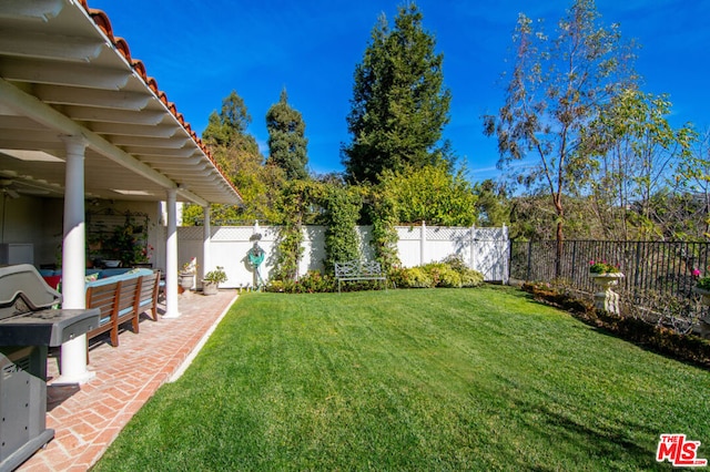 view of yard with an outdoor hangout area and a patio