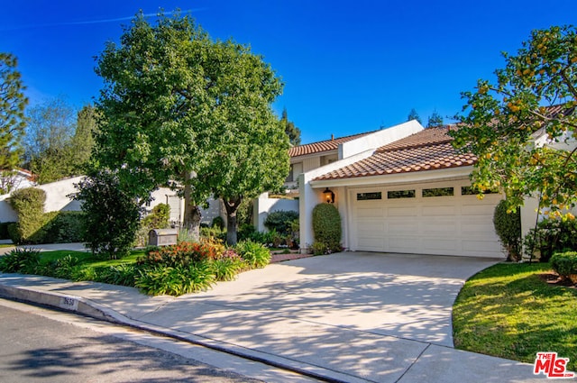 view of front of property with a garage