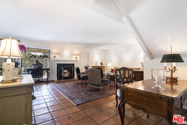 tiled living room with beam ceiling