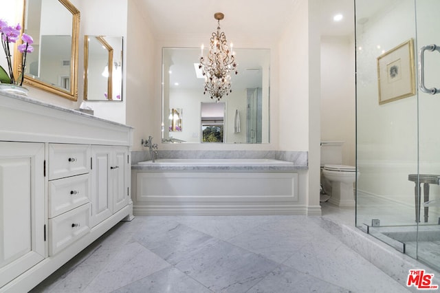 bathroom with vanity, toilet, a chandelier, and a bath