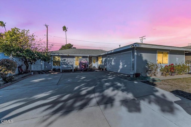 view of front of property with a garage