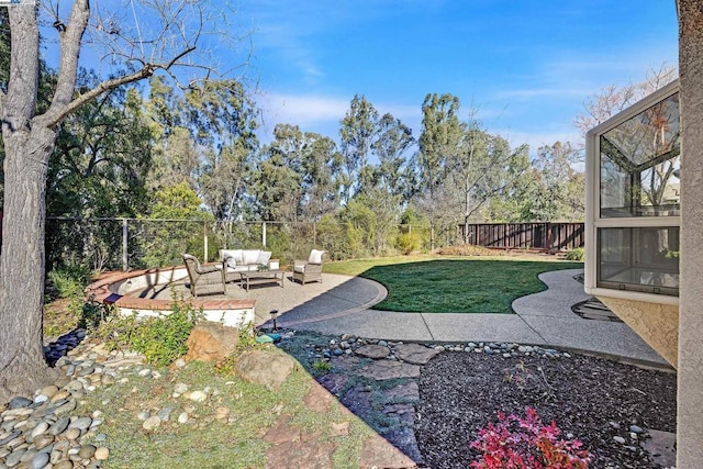 view of yard with a patio area and outdoor lounge area