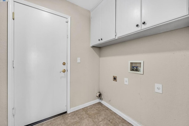 laundry room featuring cabinets, hookup for a washing machine, and electric dryer hookup