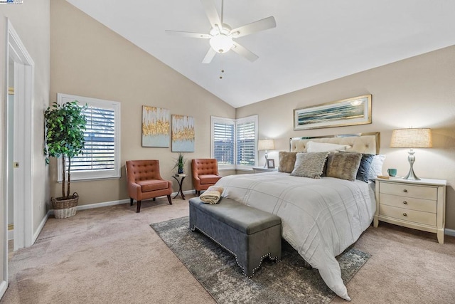 bedroom with light carpet, high vaulted ceiling, and ceiling fan