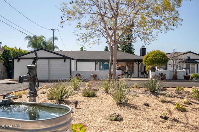 view of front of home featuring a garage