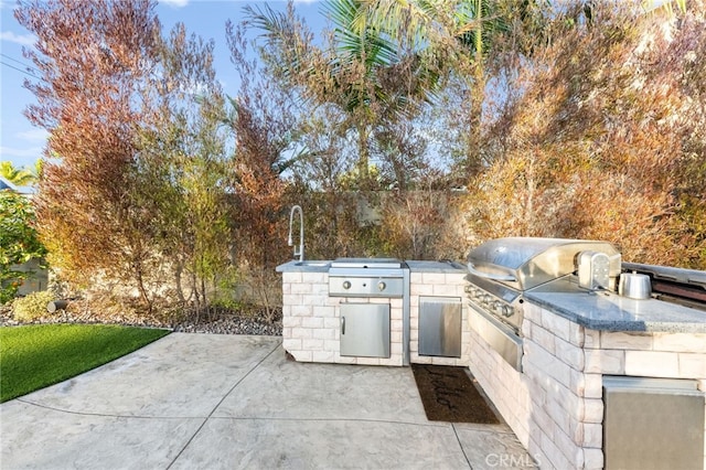 view of patio with area for grilling