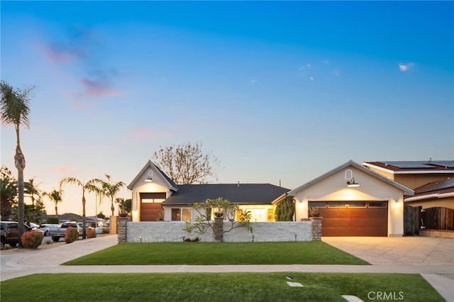 view of front of home with a lawn