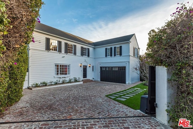 view of front of house with a garage