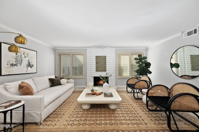 living room featuring crown molding and a fireplace