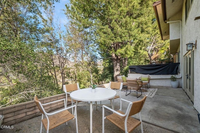 view of patio with an outdoor living space