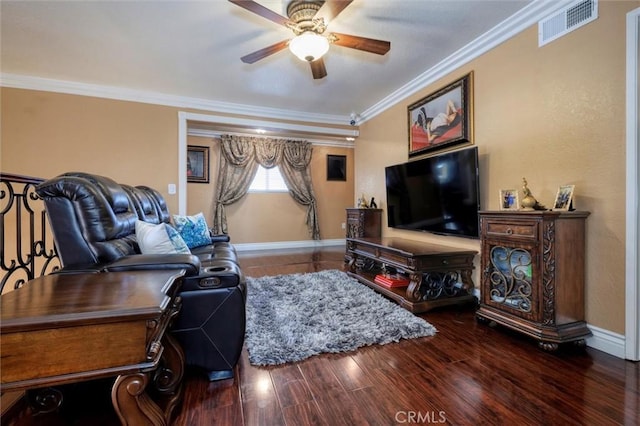 living room featuring ceiling fan, ornamental molding, and wood-type flooring