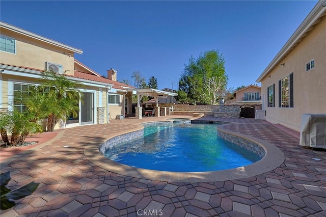 view of swimming pool featuring a patio