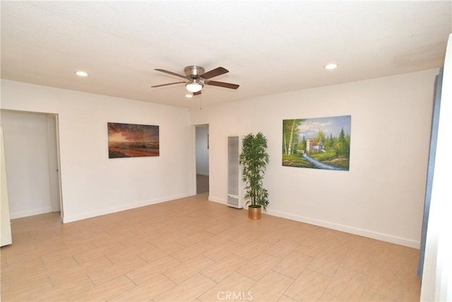 empty room featuring ceiling fan