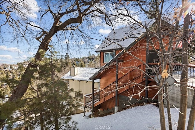 view of snow covered property