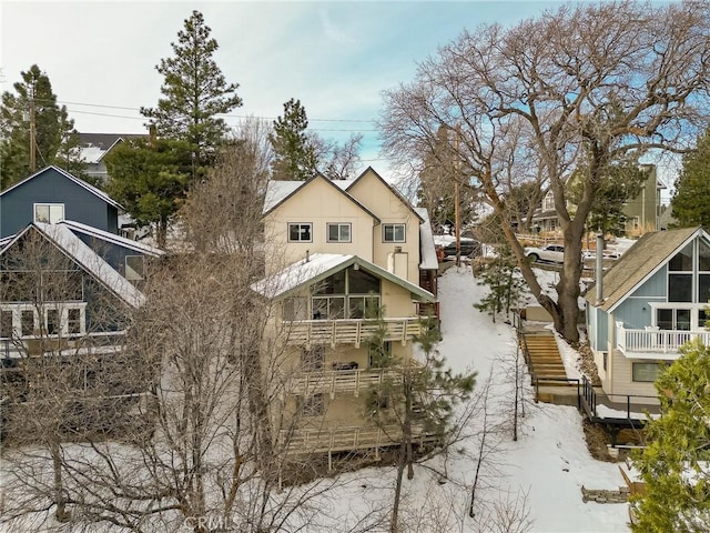 view of snow covered property