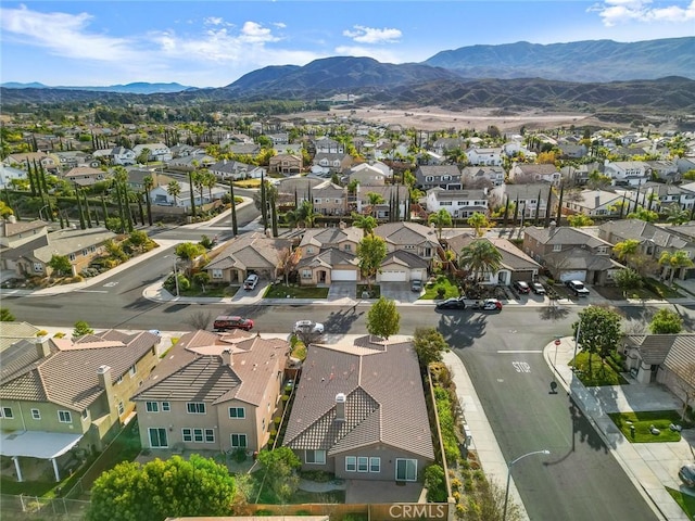 drone / aerial view featuring a mountain view