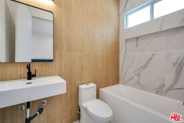 bathroom with sink and toilet