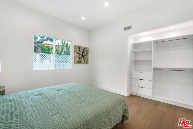 bedroom featuring hardwood / wood-style flooring