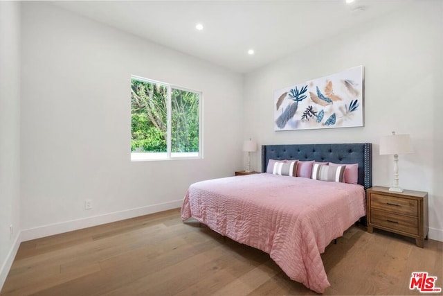 bedroom featuring light hardwood / wood-style floors