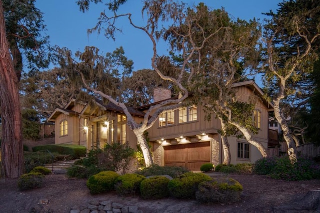 view of front of property with a garage