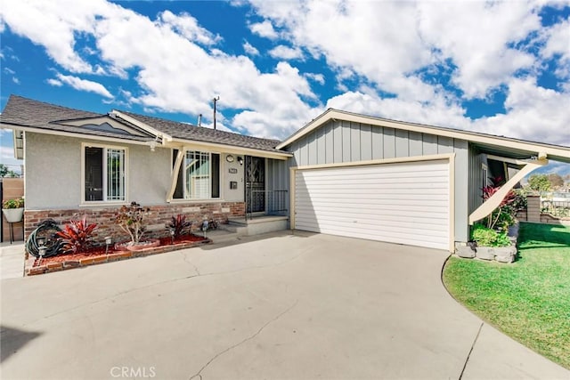 ranch-style home with a garage