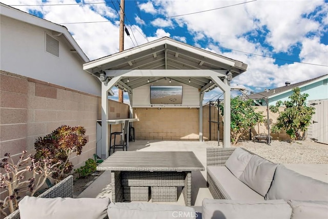 view of patio / terrace with a gazebo and an outdoor living space