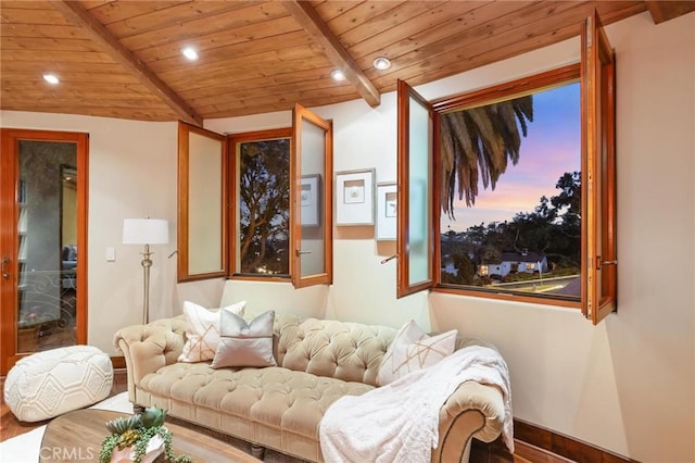 living room featuring baseboards, lofted ceiling with beams, wooden ceiling, wood finished floors, and recessed lighting