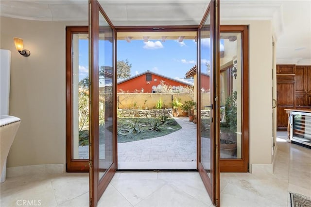 doorway to outside with wine cooler