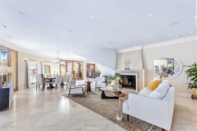 living room with a fireplace, baseboards, crown molding, and recessed lighting