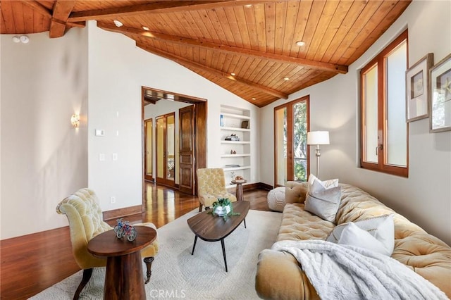 living room with wood ceiling, built in shelves, vaulted ceiling with beams, and hardwood / wood-style flooring