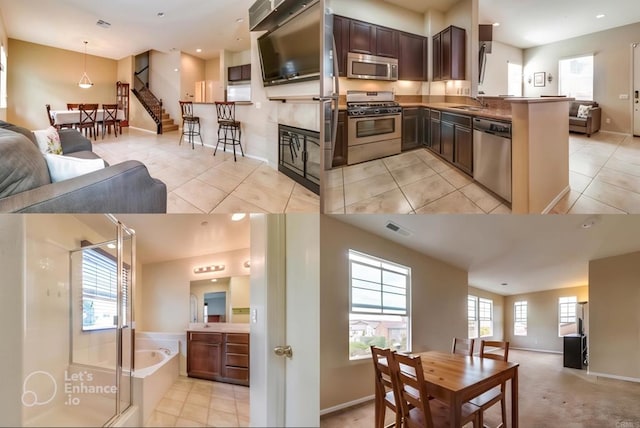 kitchen with dark brown cabinets, light tile patterned floors, kitchen peninsula, a wealth of natural light, and stainless steel appliances