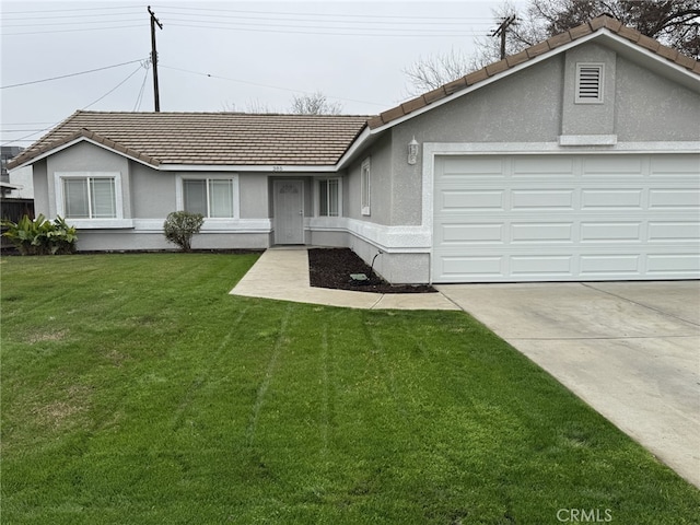 single story home with a garage and a front lawn