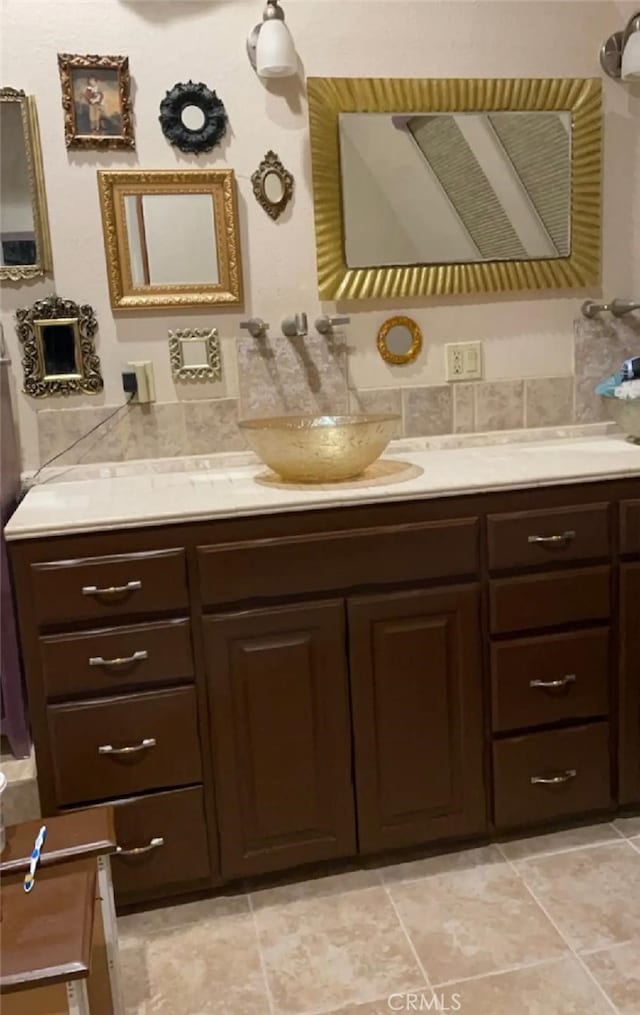 bathroom featuring backsplash and vanity