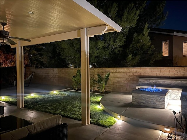 view of patio at twilight