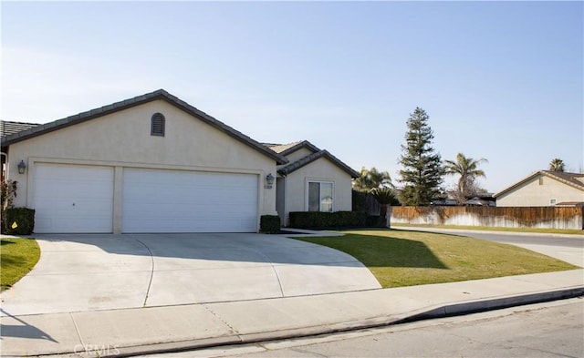 ranch-style home featuring a garage, a front lawn, and a water view