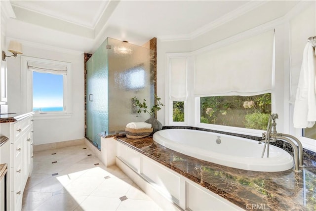 bathroom featuring vanity, tile patterned floors, ornamental molding, and shower with separate bathtub