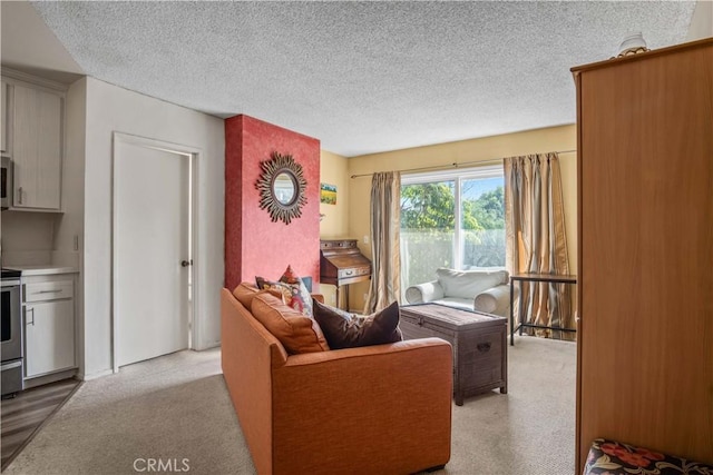 living room with light carpet and a textured ceiling