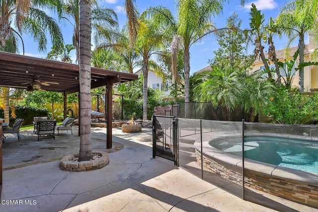 view of patio featuring an outdoor fire pit