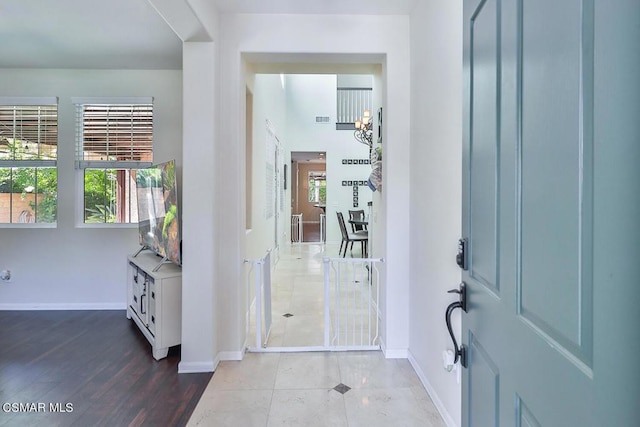 foyer featuring tile patterned flooring