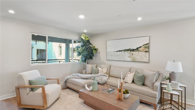 living room with light hardwood / wood-style flooring