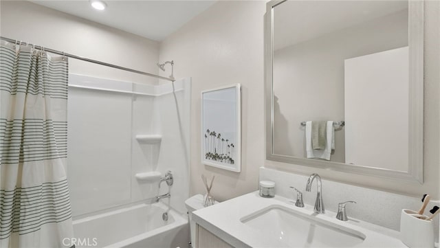 bathroom featuring vanity and shower / tub combo