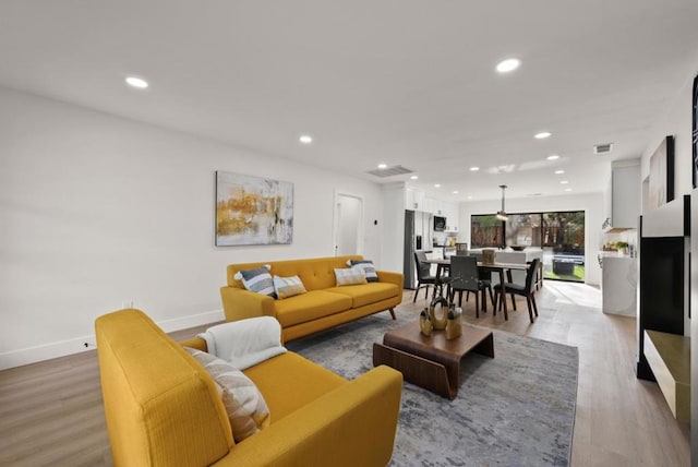 living room with light wood-type flooring