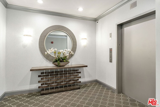 hallway with elevator and ornamental molding