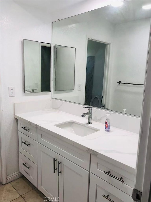 bathroom featuring vanity and tile patterned floors