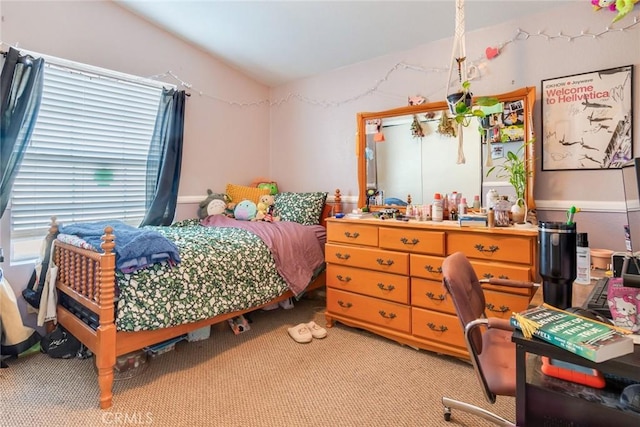 bedroom with light colored carpet