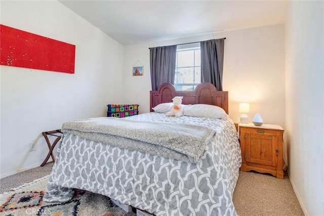 bedroom featuring carpet